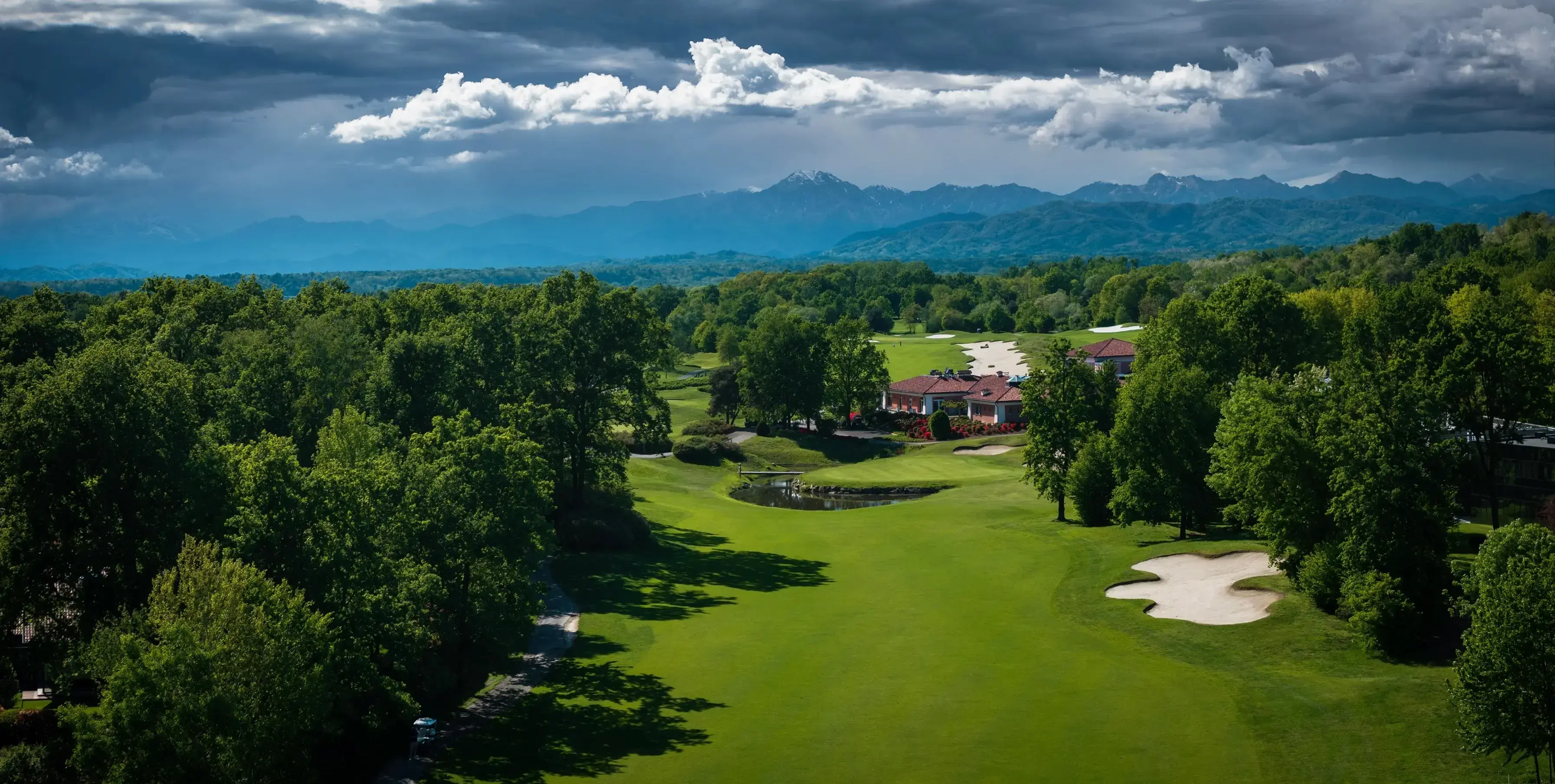 Aerial view across Bogogno Golf Resort towards Monte Rosa