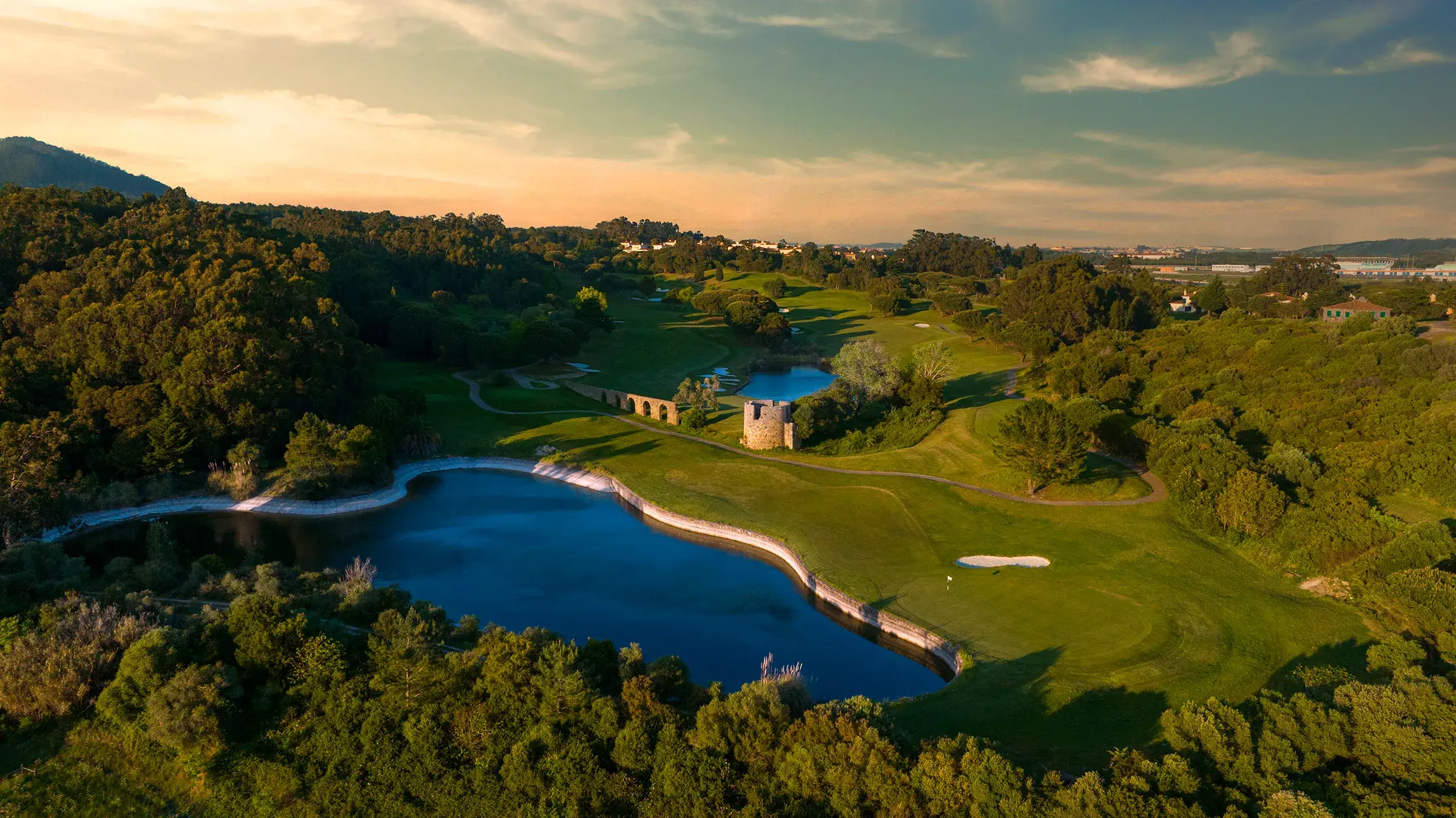 Aerial view of the lakeside golf course at Penha Longa Resort